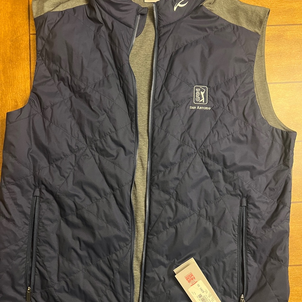 KJUS brand golf zip-up vest from TPC San Antonio
